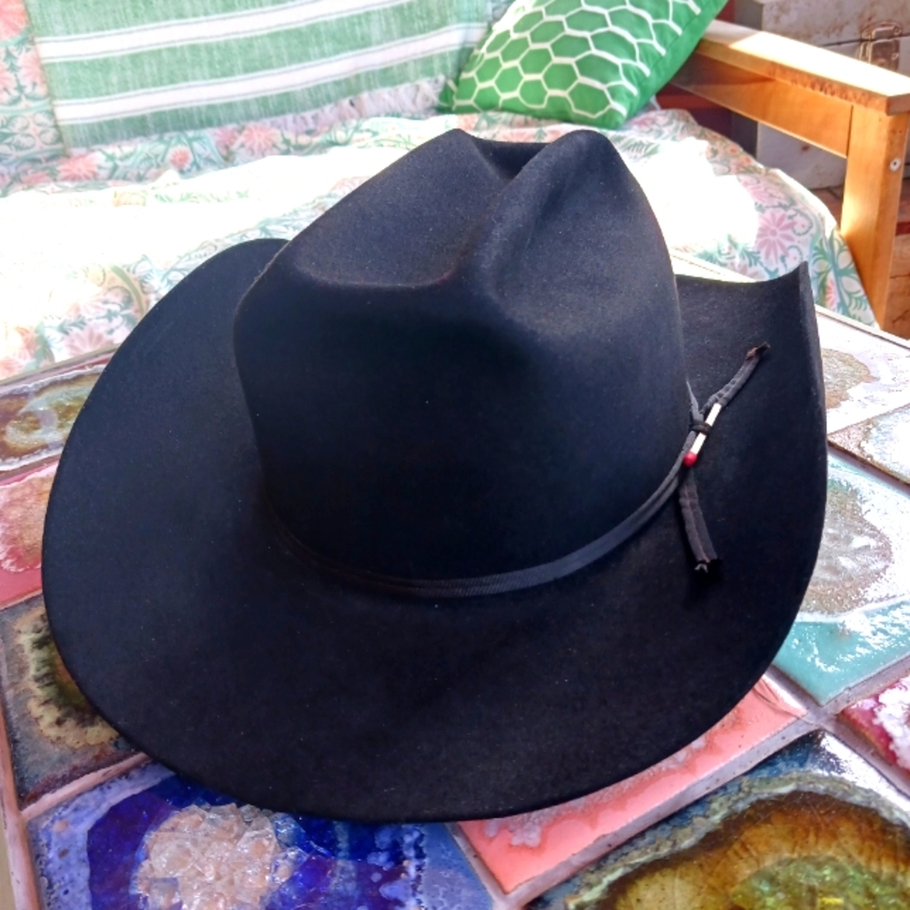 Miller brothers cowboy hat with ticket stubs inside dating from 1962-1989